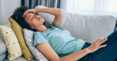 Person drinking water for summer dehydration and vomiting relief