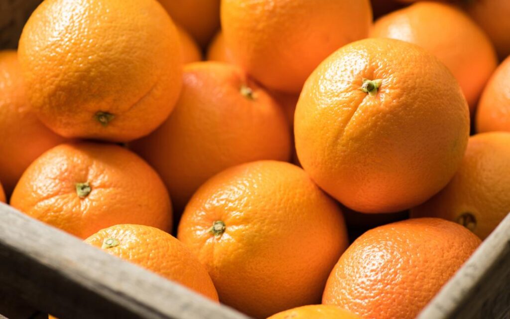 Fresh oranges rich in vitamin C for fatty liver health support diet